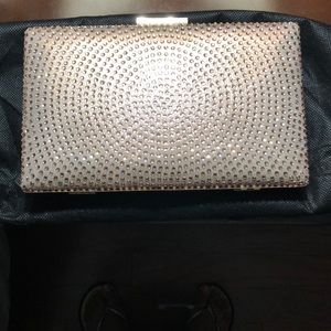 Brand new rose gold clutch